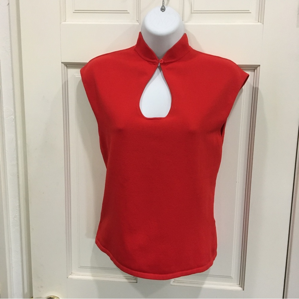Cyrus bright red top with mandarin collar and cut out oval on upper chest